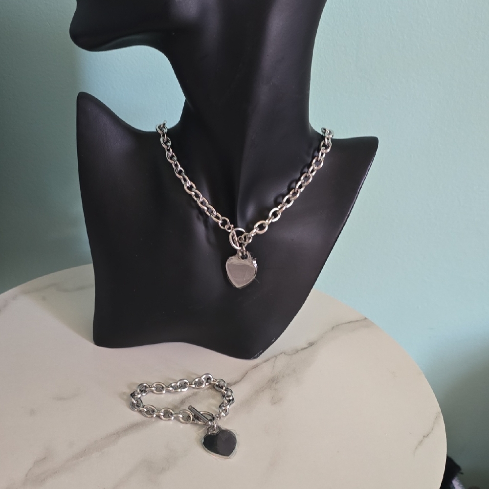 Stainless Steel Silver Heart Pendant Necklace and Bracelet Set.